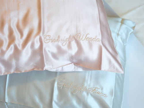 Personalized 22 momme double sided mulberry silk pillowcase with custom embroidered name.