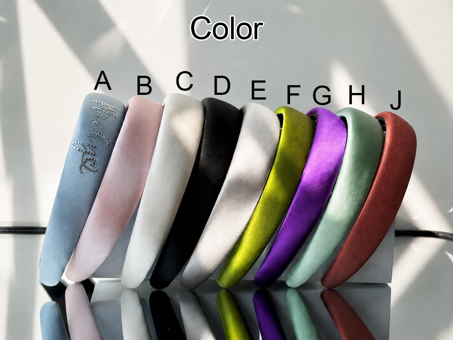 Color chart for personalized silk padded headbands with multiple color options for custom orders.