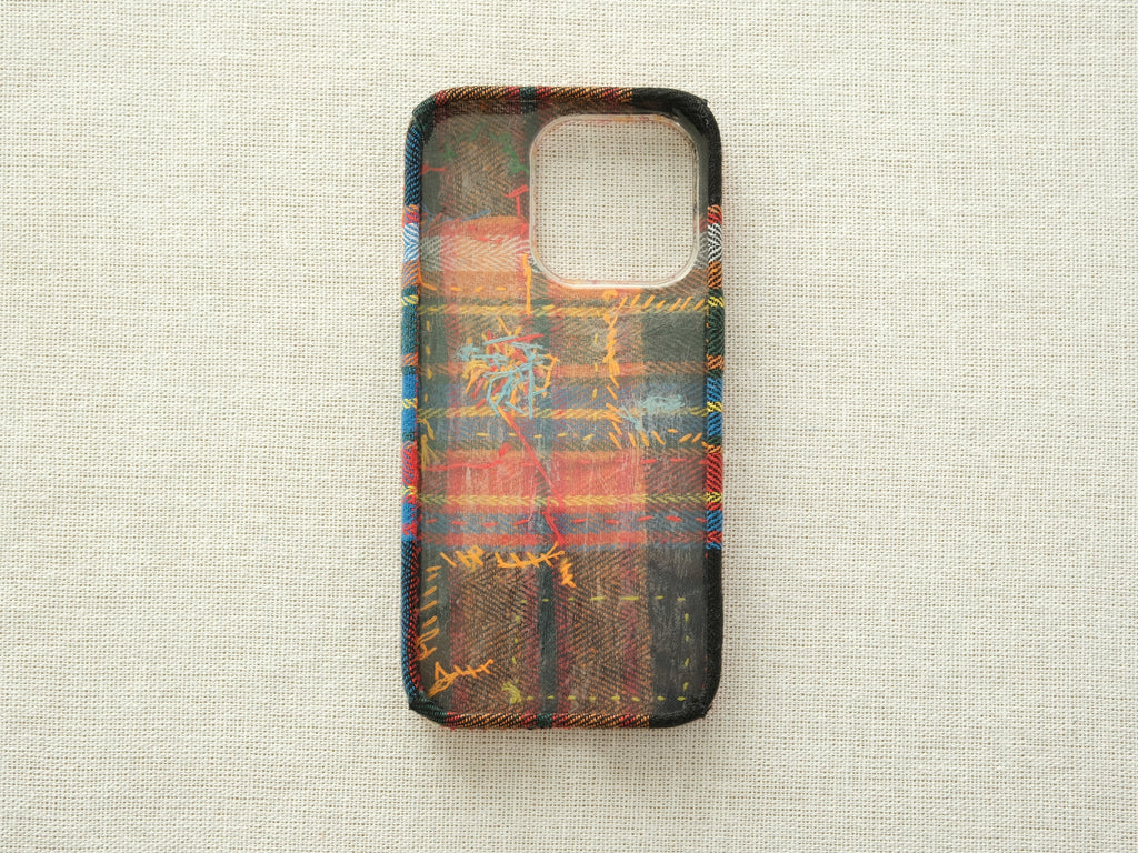 Interior view of the "Cherry & Fireworks" case, showcasing the complex craftsmanship and intricate stitching.