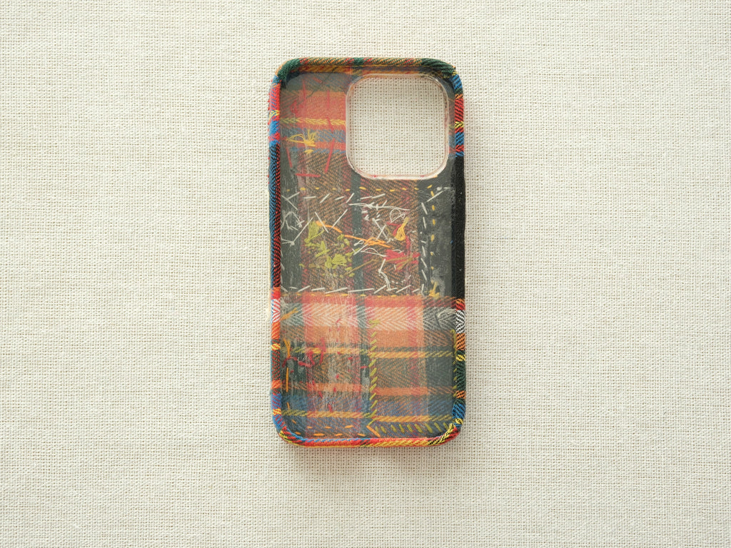 Interior view of the "Snowman & Trees" case, showing the lining and handcrafted embroidery details.