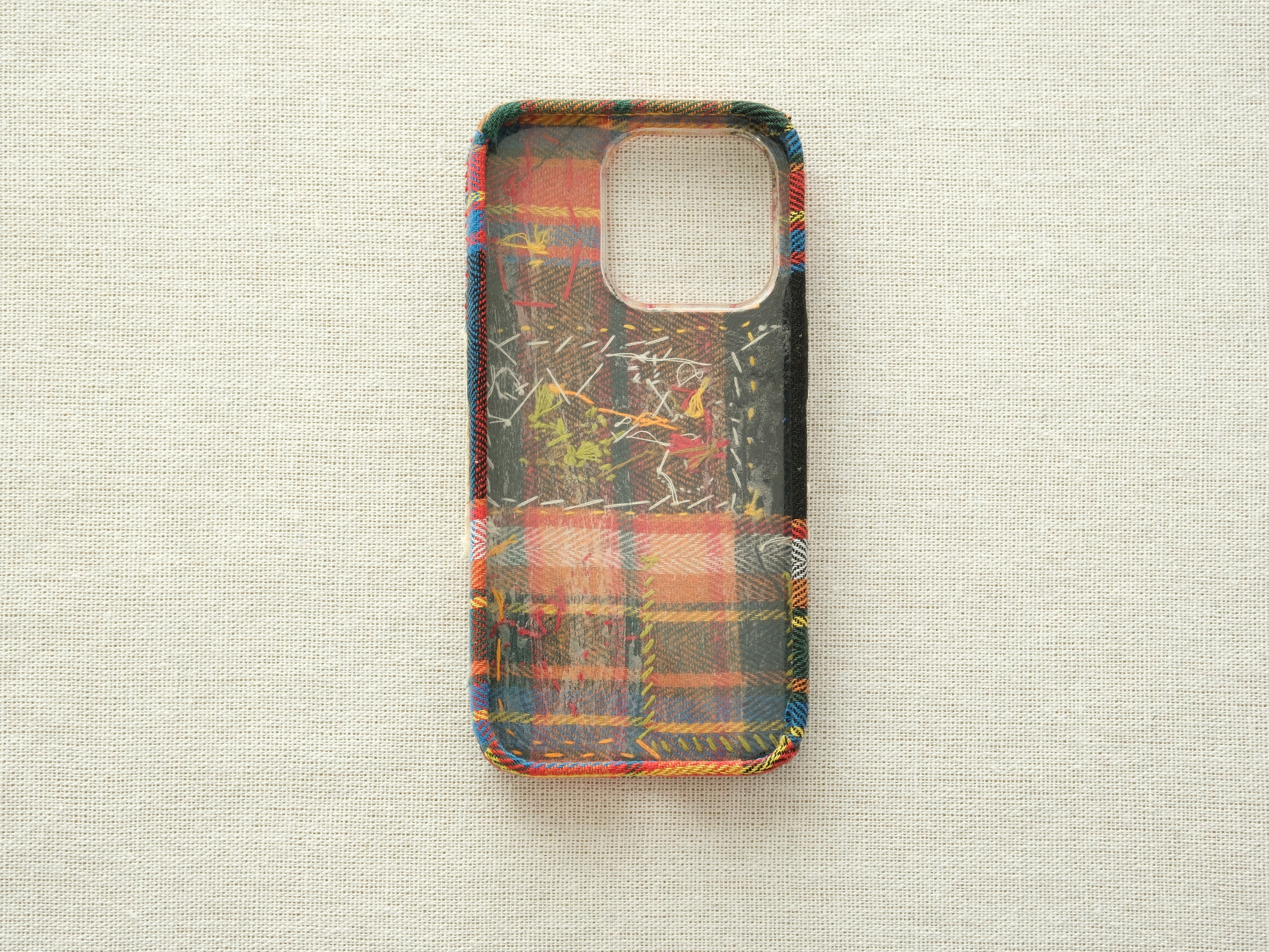 Interior view of the "Snowman & Trees" case, showing the lining and handcrafted embroidery details.