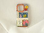 Handmade patchwork phone case with embroidered snowman, pine trees, and a gingham star, winter-inspired style.