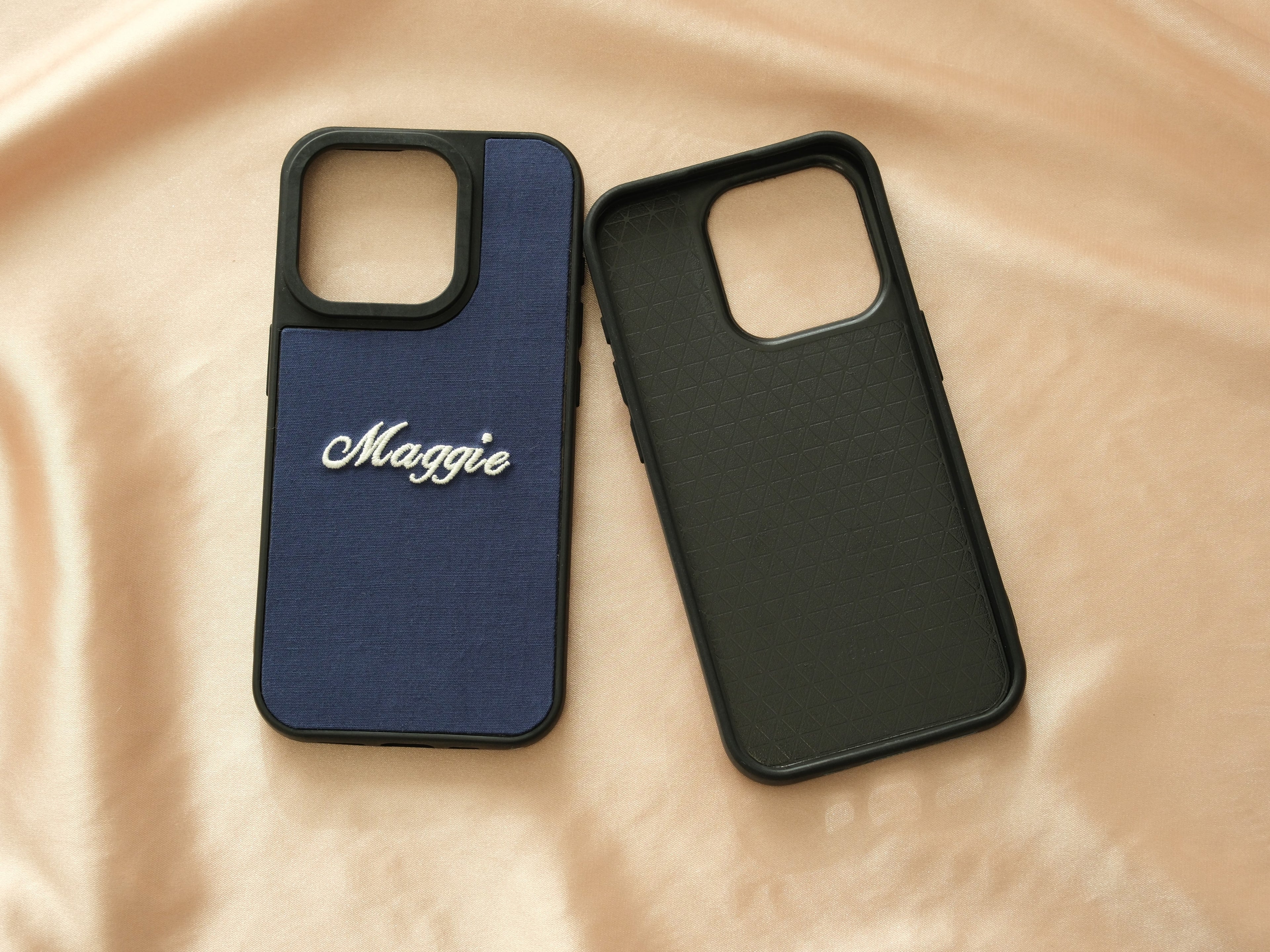 Interior and exterior view of the "Maggie" embroidered case, featuring a protective anti-scratch lining.