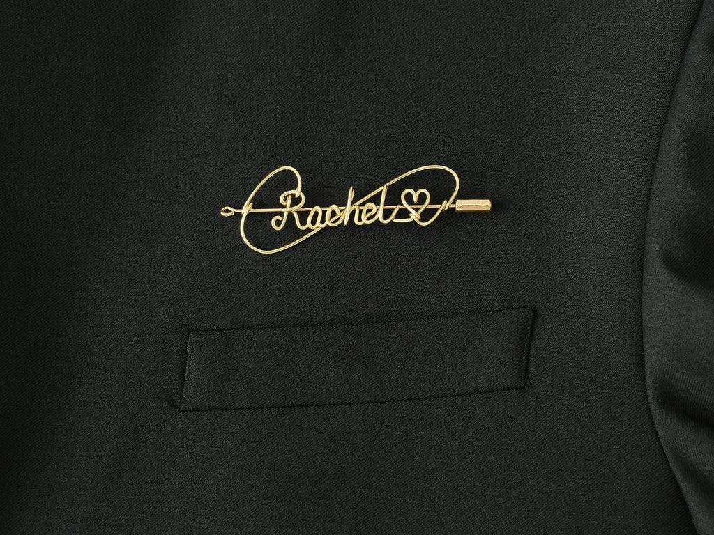 Custom name brooch with heart symbol, handmade in gold-plated copper for romantic gifts.